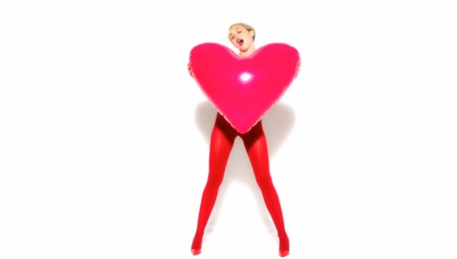 Miley Cyrus in collant Golden Lady