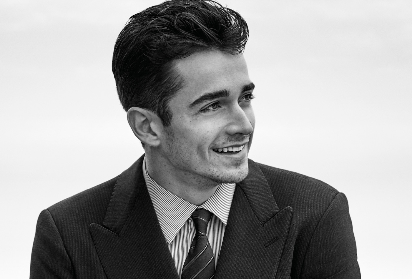 Giorgio Armani sfreccia con il pilota Leclerc